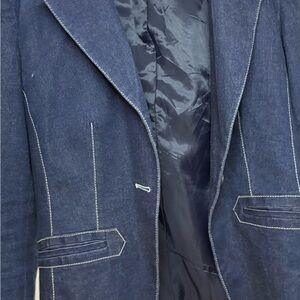 Stylish Blue Denim Jacket with white Stitching. Very tailored waist sinching fit